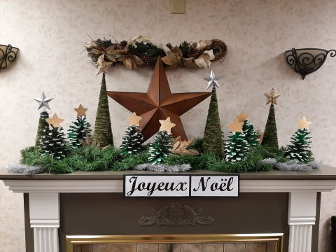 crafts on a fireplace mantle for Christmas