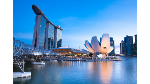 Buildings next to a body of water