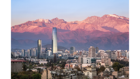 city with a mountain range behind it